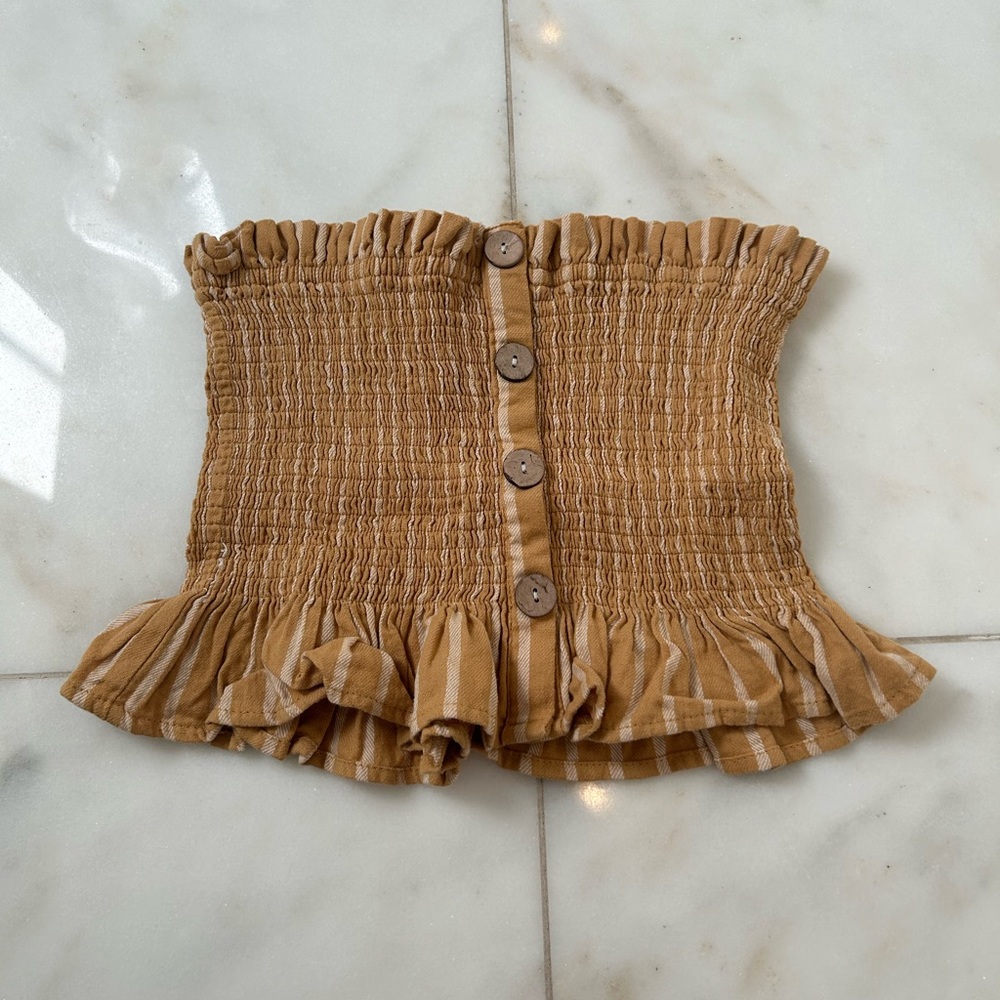 tan and white tube top